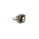 A 9 ct yellow and white gold, diamond and smoky quartz ring