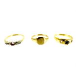 Three yellow gold and gem-set rings