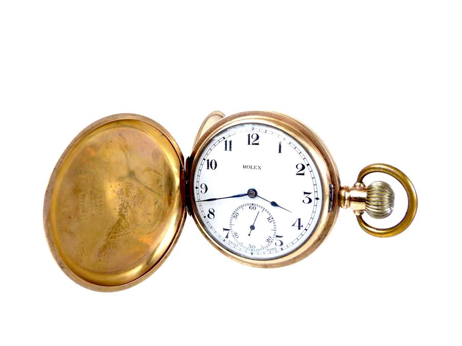 A gold plated full hunter Rolex pocket watch with subsidiary dial to the face