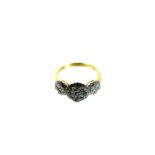 An 18 ct yellow gold, diamond cluster ring of 0.75 carats