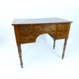 A Georgian mahogany kneehole dressing table