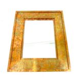 A copper-framed mirror
