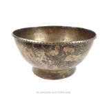 An Eastern white metal footed bowl