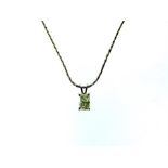 A 14ct White gold emerald cut diamond pendant necklace of 80 points