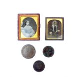 Two daguerreotype photographs and a collection of miscellaneous coins.