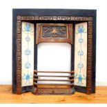 An Art Nouveau style cast iron fire place