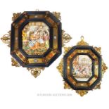 A graduated pair of octagonal Italian Capodimonte porcelain plaques