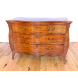A George III Mahogany Serpentine Chest of drawers.