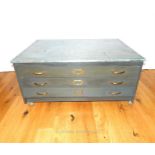 A grey painted low plan chest