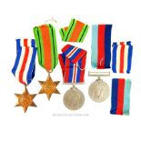 A set of four WWII medals in original box