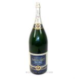 A Jacquart Champagne Nebuchadnezzer size glass advertising bottle