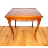 A mahogany games table with a chess board top