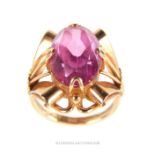 A Russian 14 carat Yellow gold and ruby/pink sapphire ring.