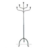 A wrought iron floor standing candelabrum