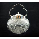 A Sterling Silver Mounted and Cut Glass Biscuit Barrel.