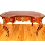 A Louis XV style kidney shaped writing table