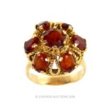 An 18 ct yellow gold, garnet and filigree, cluster ring