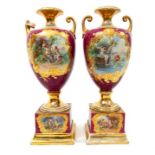 A pair of Continental vases, of amphora design