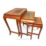 A nest three Chinese hardwood tables