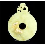 A Chinese carved jade bi-disc