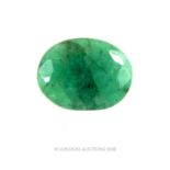 An oval loose faceted emerald