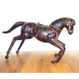 A Small decorative Leather Horse.