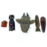 Collection of five African and Indonesian masks