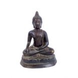 A Tibetan bronze Buddha