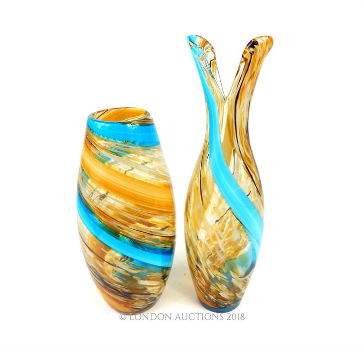 A pair of Modernist hand blown glass vases