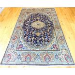 An extremely fine central Persian part silk Nain carpet