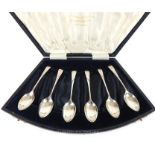 A cased set of six Sterling Silver Demitasse Coffee Spoons.