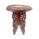 A carved and inlaid, Indian, tri-pod table