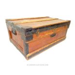 A vintage, wooden steamer trunk/chest