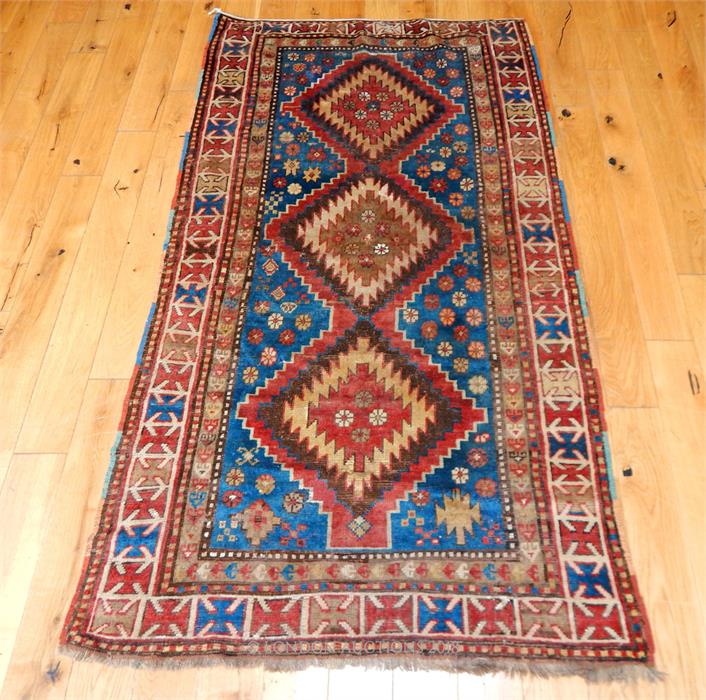 An antique, hand-woven, woollen, Russian Kazak rug, (Circa 1890)