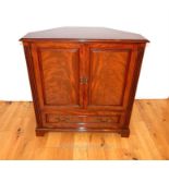 A flame mahogany and satin wood-inlaid, TV corner cupboard