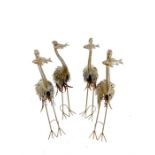 Four, metal, sculptural herons