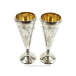 A pair late 19th / early 20th century American sterling silver vases