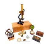 A Vintage Microscope. Two Snuff boxes. Opera glasses, Compasses etc (a lot).