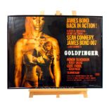 A reproduction James Bond Goldfinger film poster