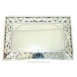 A Venetian style wall mirror of rectangular form