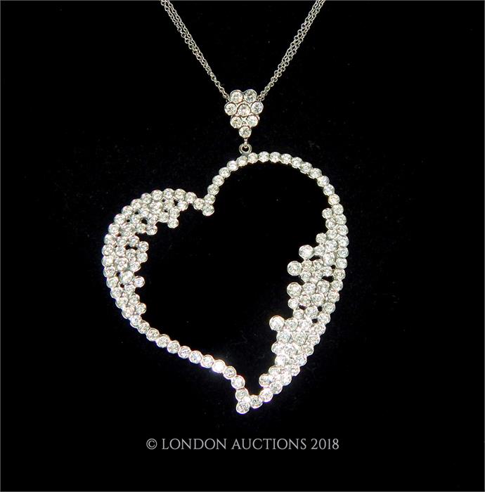 A Modern design Diamond Set Heart Shaped Pendant Necklace.