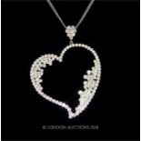 A Modern design Diamond Set Heart Shaped Pendant Necklace.