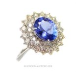 A Tanzanite and Diamond double Halo Cluster Ring.