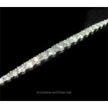 A Diamond Set Line Bracelet.