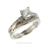 A 14K White Gold Mounted Princess Cut Solitaire Diamond Ring.