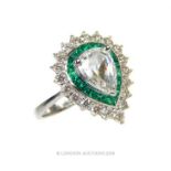 A Fine Emerald and Diamond Heart Shaped Ring.