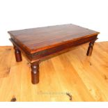 An Indian hardwood low table