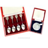 A Cased Set of Four Sterling Silver Queen Elizabeth II Silver Jubilee Commemorative Spoons