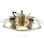 A silver plated three piece tea set, together with a silver plated tea tray