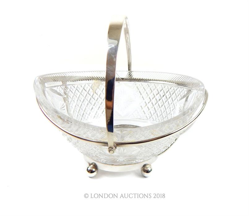 A Victorian Sterling Silver and Cut Glass Sweetmeat Basket.